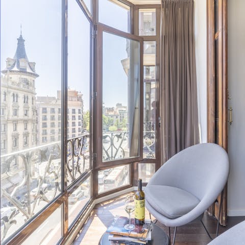 Pour some wine and watch the world go by from the sunny alcove