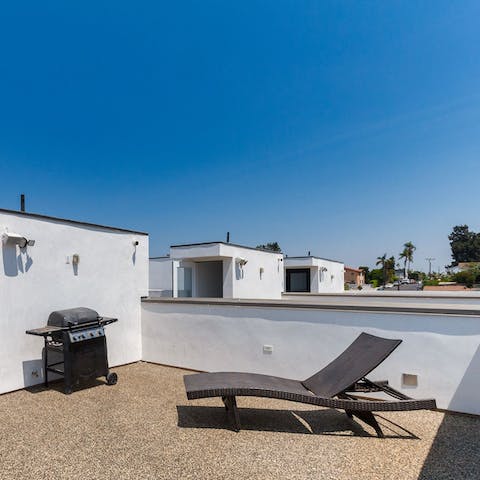 Invest in some tanning time on the shared rooftop
