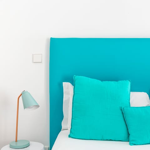 The turquoise bedroom area