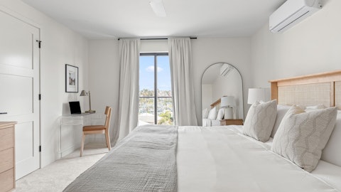 Wake up to sunshine and sea breezes in the main suite