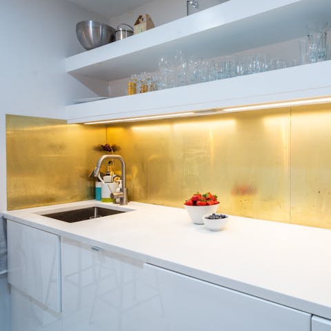 the golden backsplash of the kitchen