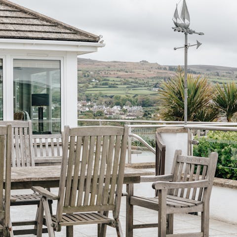 Gather for a barbecued feast on the outdoor dining terrace