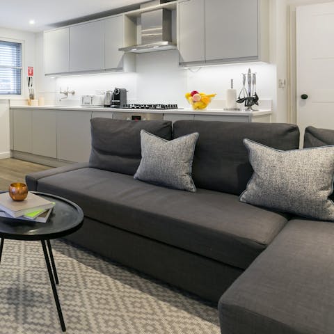 Make yourself at home on the sofa with a glass of wine after a day of touring the city on foot