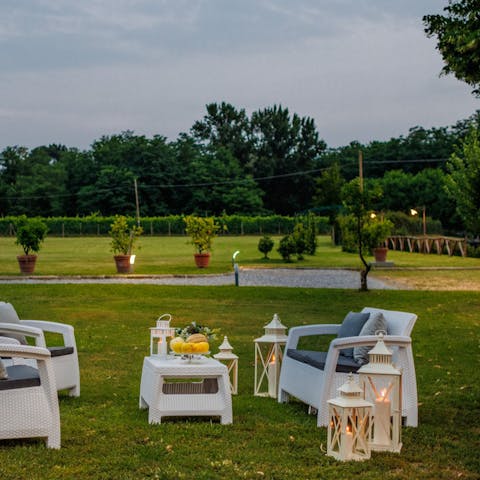 Savour a glass of local wine while relaxing in the garden