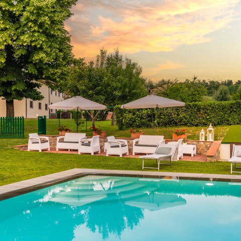 Take a sunset dip in the swimming pool