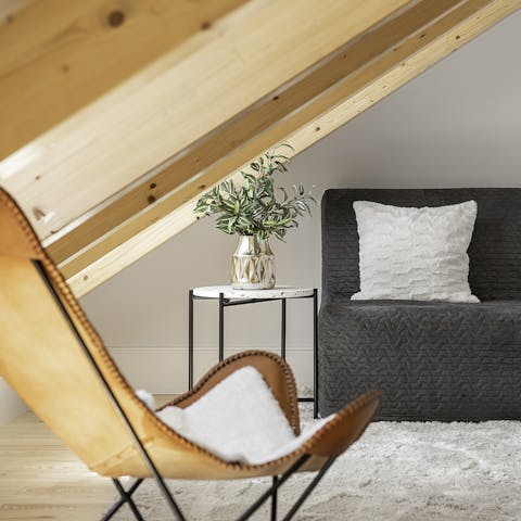 Sleek pine beams on the second floor