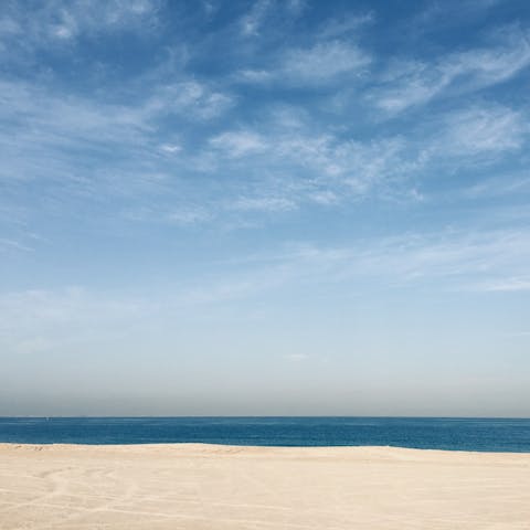 Sunbathe on the on-site private beach