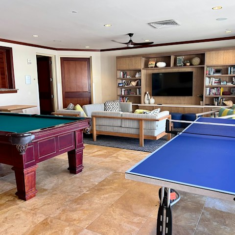 Enjoy a game of pool or table tennis in the communal family room