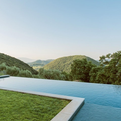 Plunge into the large infinity swimming pool to escape the midday heat