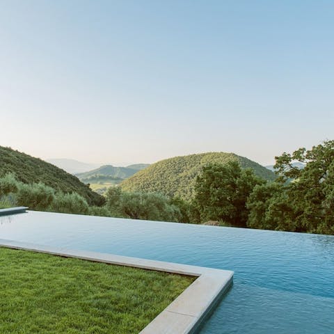 Plunge into the large infinity swimming pool to escape the midday heat