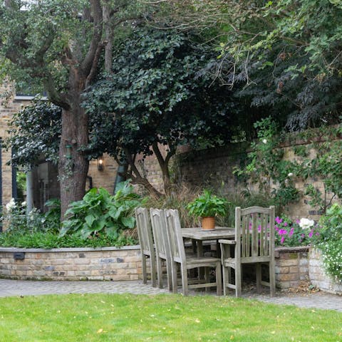 While away summer evenings in the private garden
