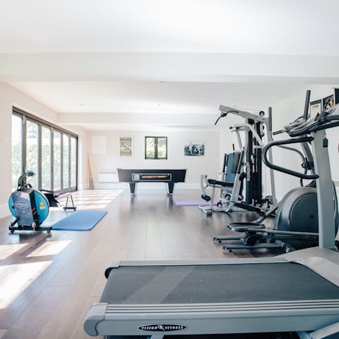Start the day with a sweaty session in pool house's gym or play billiards instead