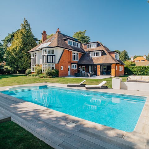 Splash about in the home's swimming pool during the warmer months