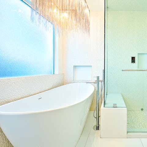 Soak the day away in the free standing luxurious bath tub