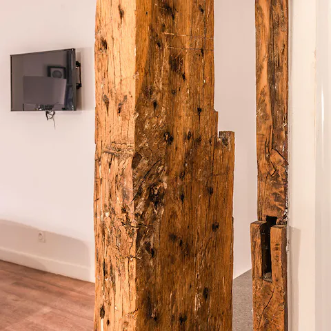 Admire the way the exposed rustic beams add some old-world charm