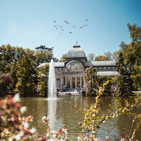 Take a stroll around El Retiro Park, fifteen minutes away
