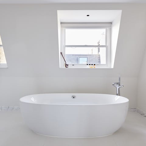 Take a long soak in the swanky freestanding bathtub