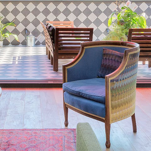 The upholstered armchairs