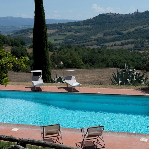 Take in the vistas of the Umbrian countryside from the pool