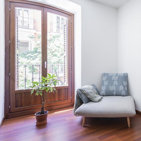 Curl up with a book on the lounge chair and bask in the sunlight