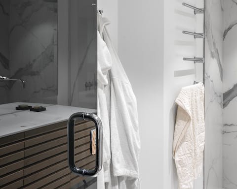 The luxurious marble-clad bathrooms