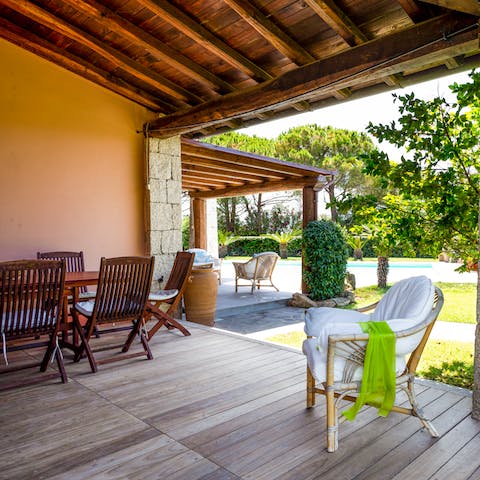 Gather for outdoor feasts on the shaded decking