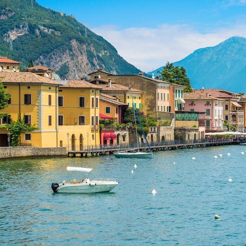 Explore Gargnano's historic villas, palazzos, churches, gardens and lemon groves, a fifteen-minute drive away