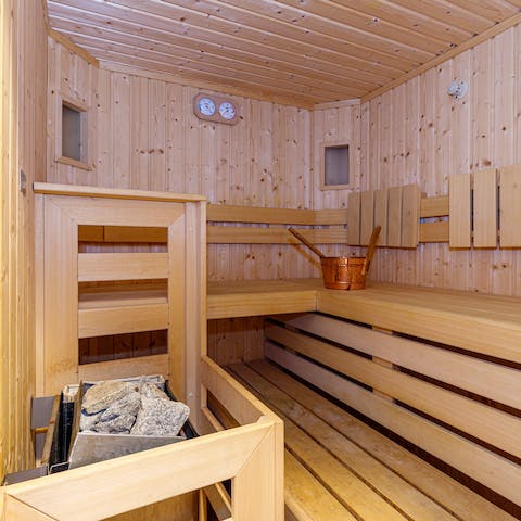 Relax and unwind in the private sauna