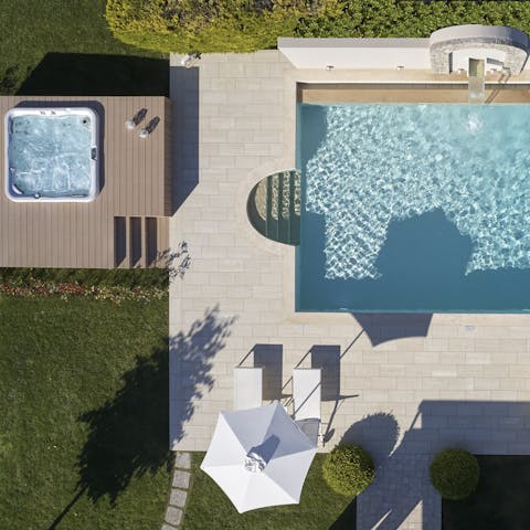 Soak up the sun from the outdoor Jacuzzi