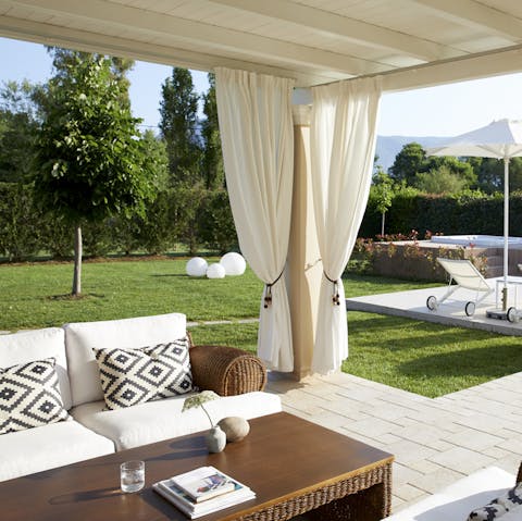 Sit in the shade of the veranda and watch time go by