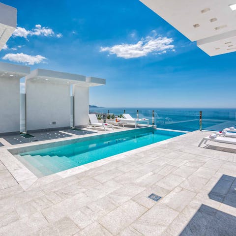 Begin each day by diving into your private swimming pool