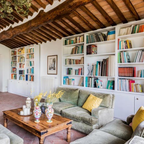 Pick out a classic from the library before relaxing in the living room