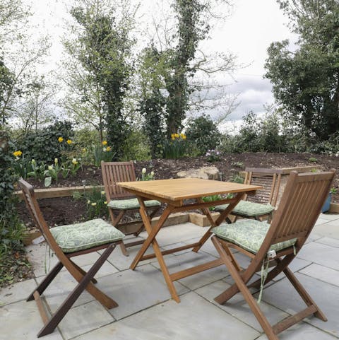 Relax with a glass of cider on the private patio