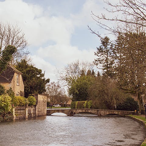 Take a relaxing stroll along the River Windrush in Bourton-on-the-Water, 2 miles away