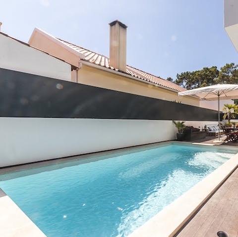 Swim laps in the long tuquoise pool