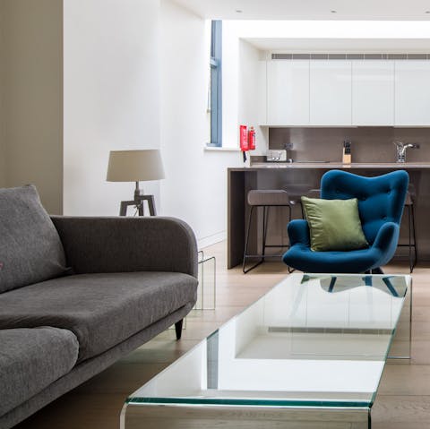 Relax on the velvet armchair and unpack the complimentary welcome package from your host