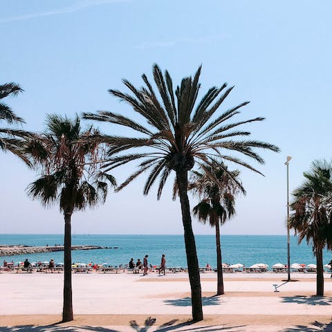 Hop in a taxi and head to Barceloneta Beach in just over ten minutes