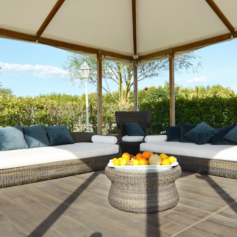 Share a bottle of Chianti in the outdoor lounge
