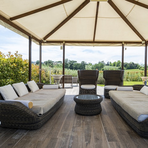 Share a bottle of Chianti in the outdoor lounge