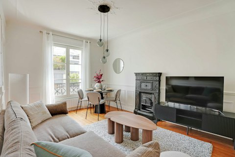 Plan your Parisian days from this light-filled living area