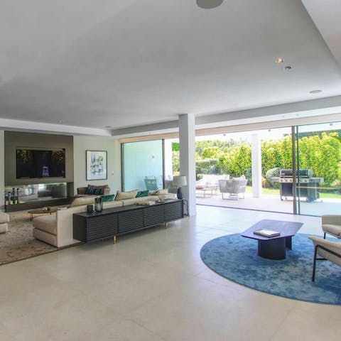 Open the automatic glass doors and blend indoors with outdoors