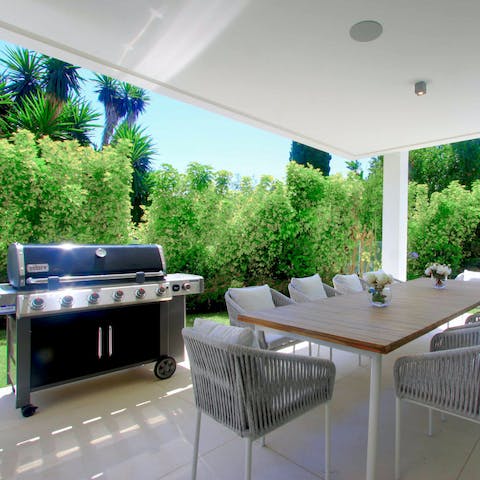 Fire up the grill and dine on the shaded terrace