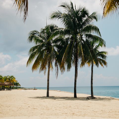 Sink your toes into the powdery sands – you'll have private beach access here