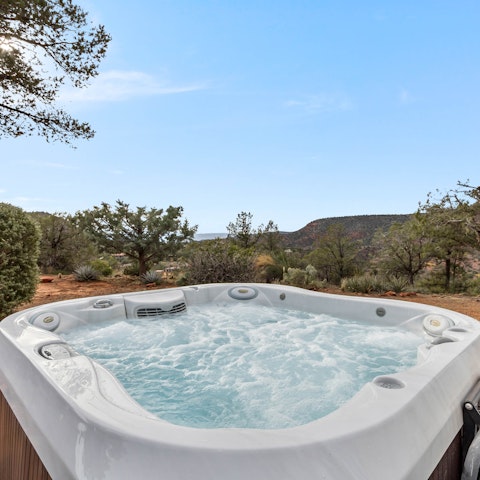 Enjoy a soak in the hot tub at dusk and watch the stars appear in the sky