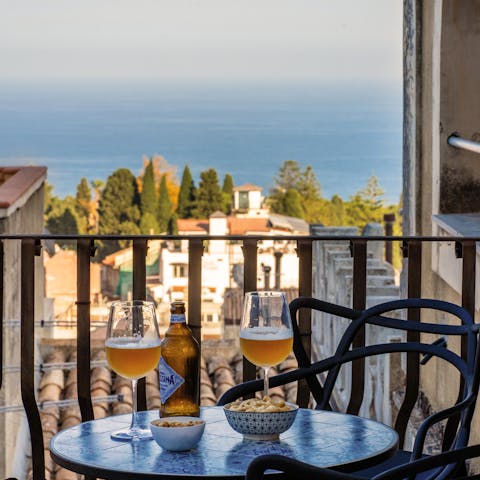 Enjoy a cold drink on the private terrace with a spectacular view