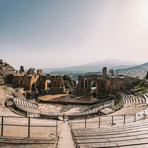 Climb up to the ancient Greek amphitheatre nearby
