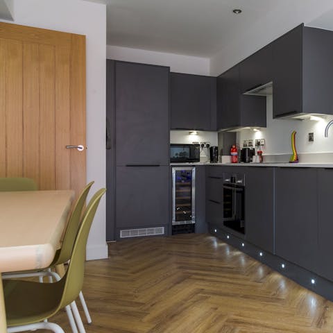 Enjoy a home cooked meal, and make the most of the kitchen's wine cooler