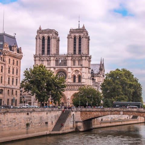 Nip over to the neighbouring  Île de la Cité to marvel at the Notre Dame, just a short walk away