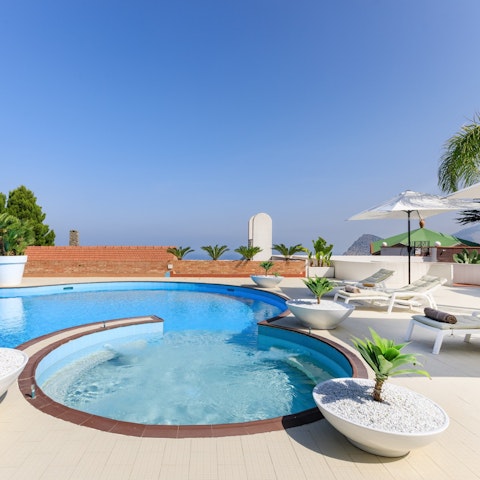 Savour the sunshine from your spot by the pool