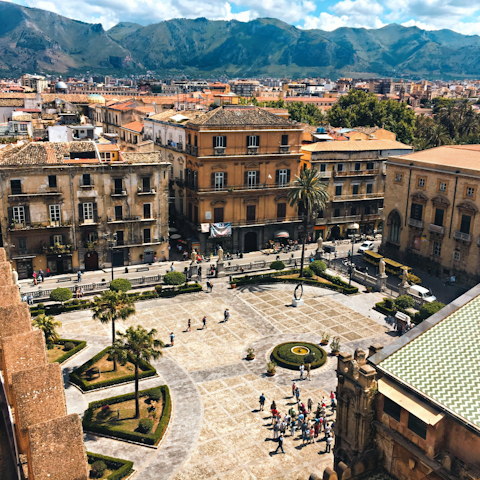Plan a day trip to the bustling city of Palermo